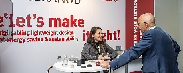 Conversations at an exhibition booth